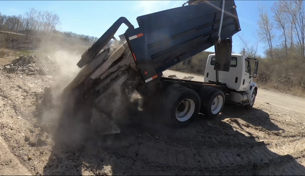 Dumping Concrete Debris Removal 01